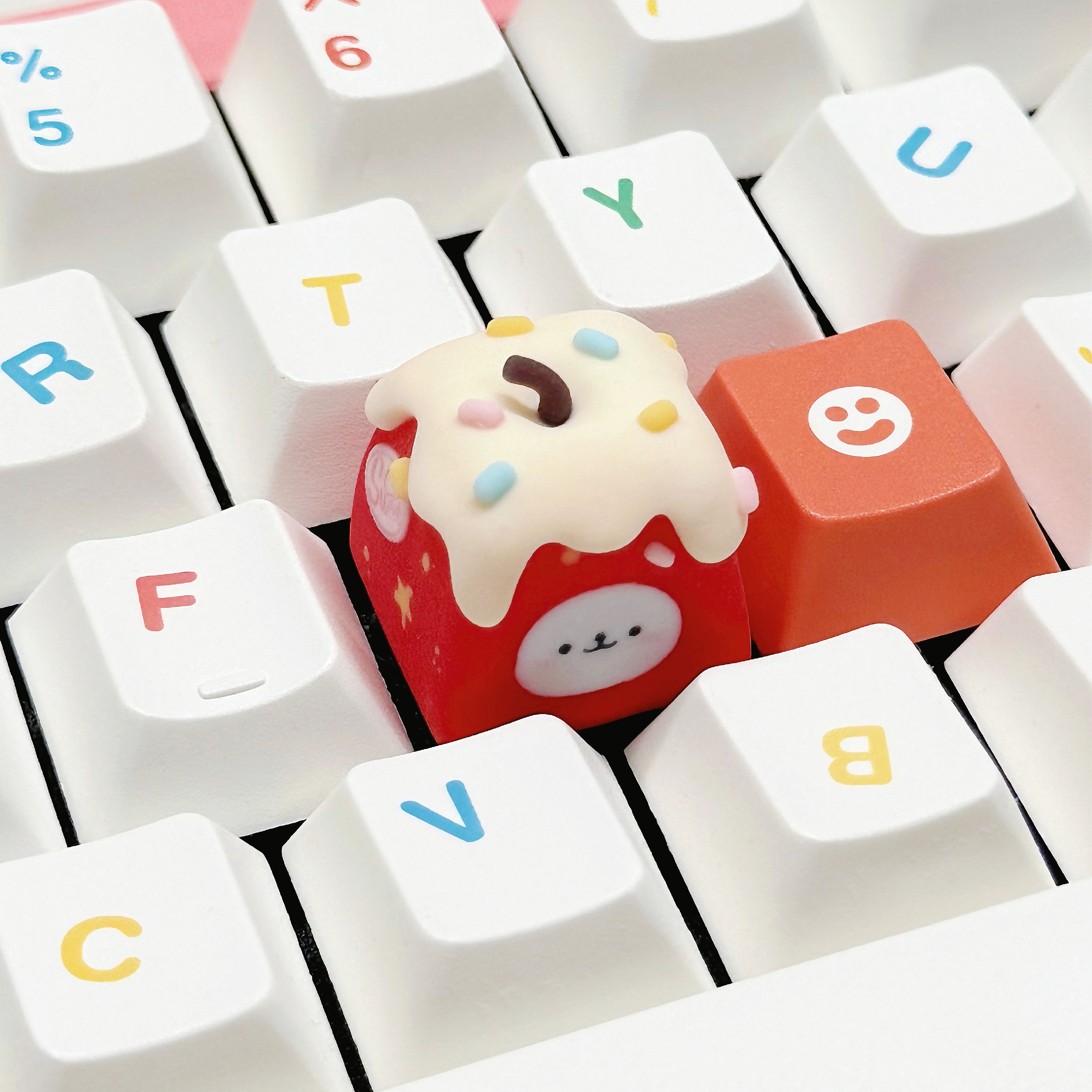 apple_red_cream_bear_keycap_on_keyboard_closeup